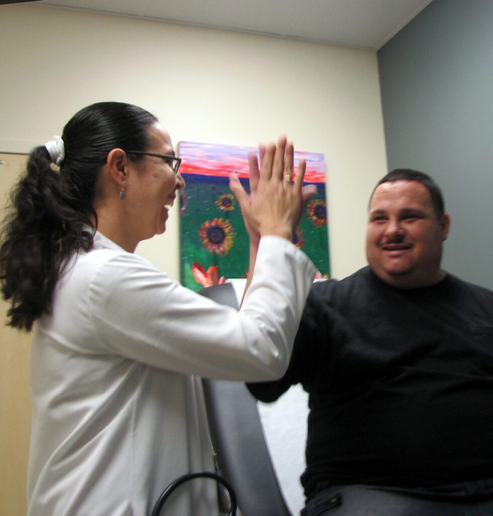 doctor giving patient a high 5